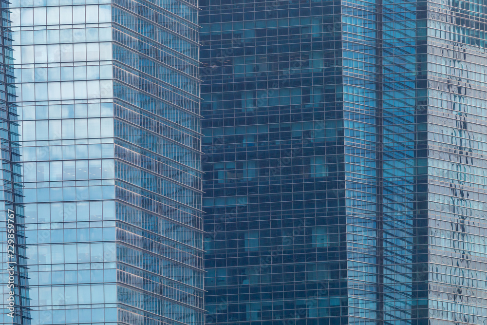 Exterior windows of tall office buildings in city