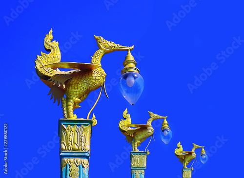 Thai  Golden Swan Lamp post on street photo