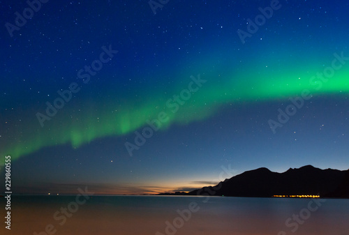 The polar lights in Norway. Tromso.Grotfjord © belov3097