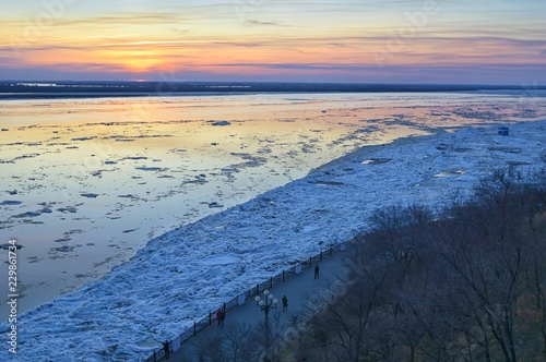 Nature spring awakening. Ice drift on the Amur river. Khabarovsk, Amur river embankment. Far East, Russia. 