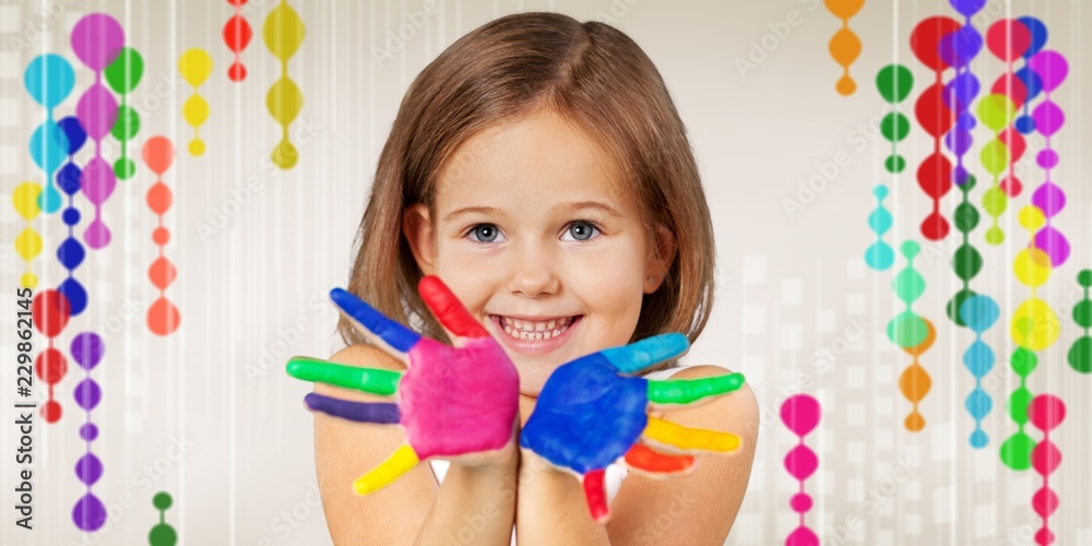 Cute little girl with colorful painted hands Cute little girl with colorful painted hands