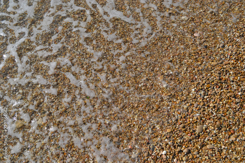 colored stones at the bottom of the sea 