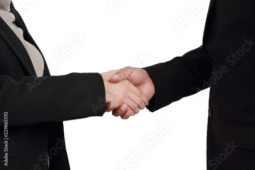shaking hand between success businessman and businesswoman isolated and white background