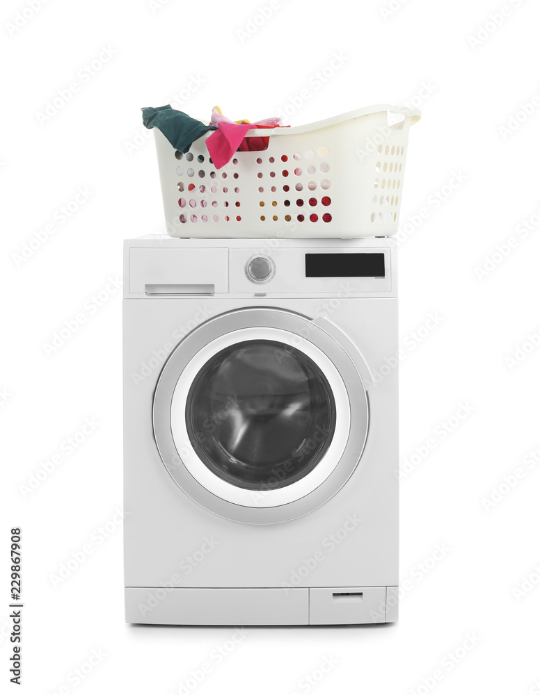 Modern washing machine and basket with laundry on white background Modern washing machine and basket with laundry on white background