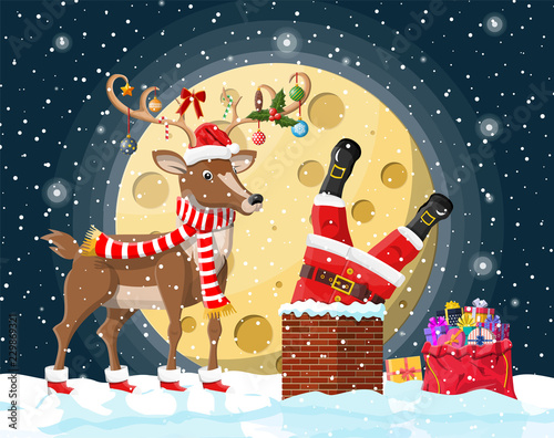 Santa claus with bag with gifts in house chimney