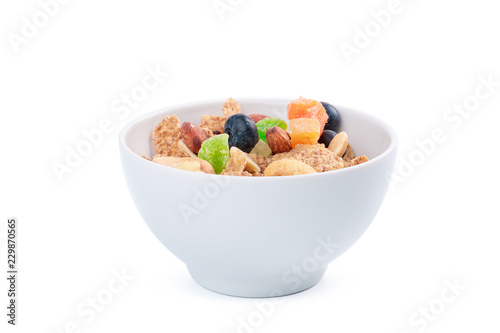 Corn flakes in a bowl isolated on white background