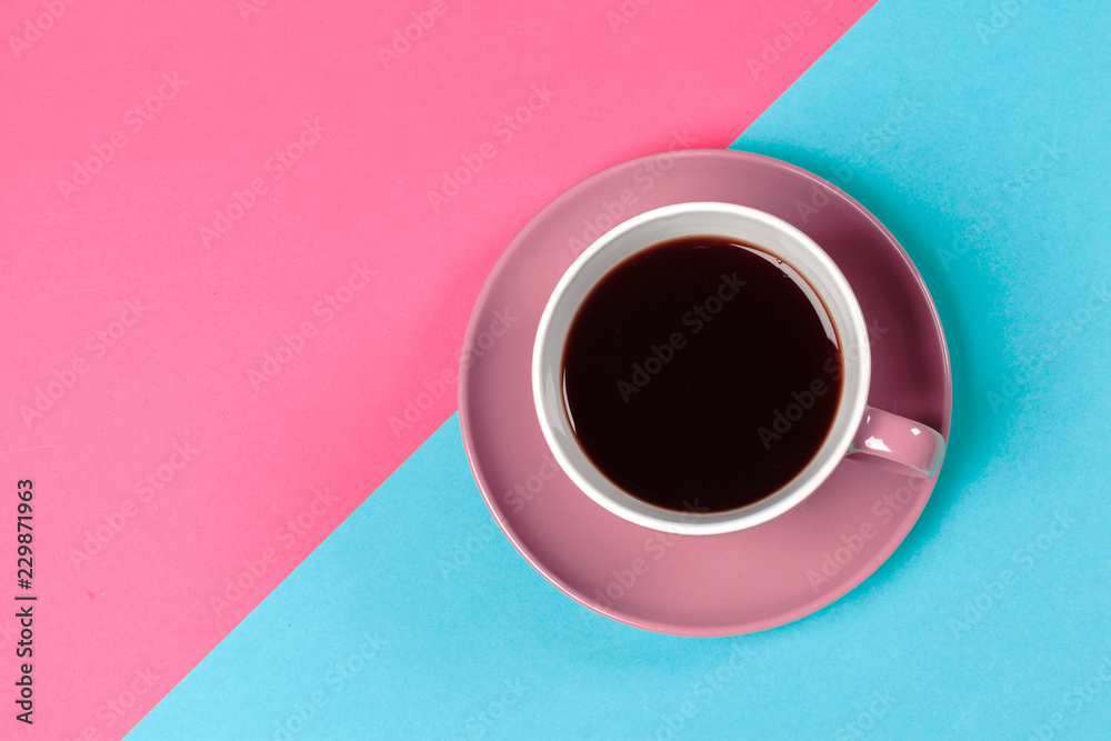 cup of coffee and saucer on color background cup of coffee and saucer on color background