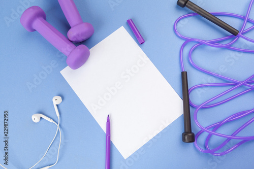 Mockup clipboard with Gym equipment dumbbell on blue background