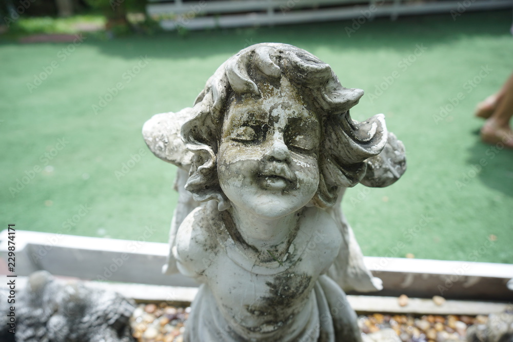 Statue in the garden. Statue in the garden.