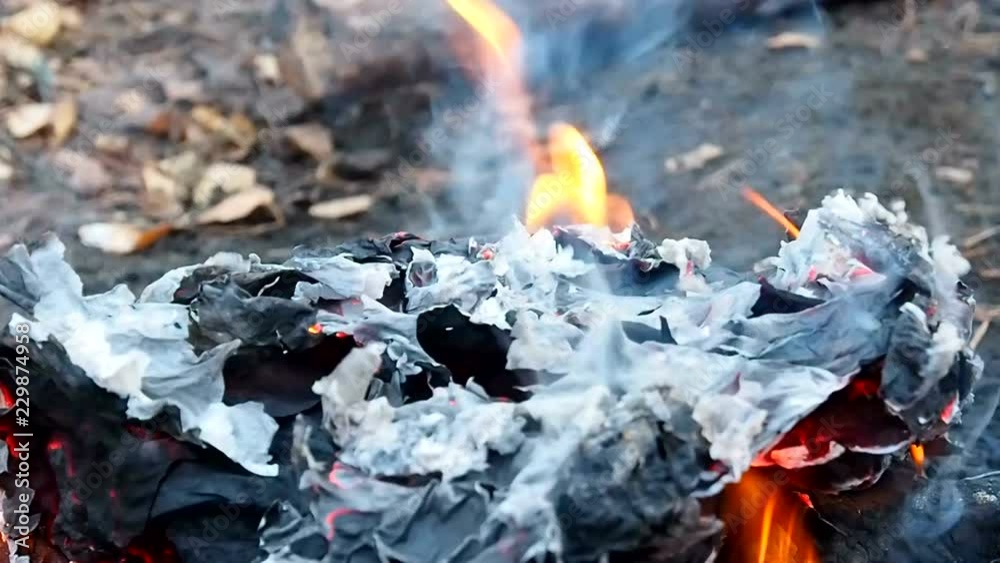 The paper burning to ashes is close. Conceptual fire destroys objects. The paper burning to ashes is close. Conceptual fire destroys objects.
