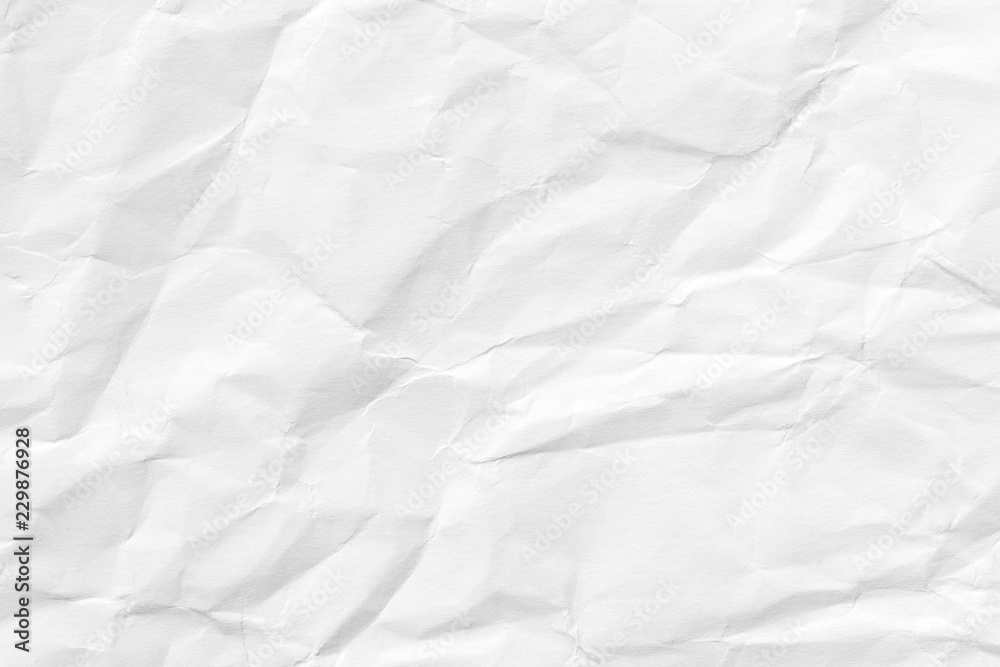The texture of white paper with kinks. Background of crumpled cardboard.