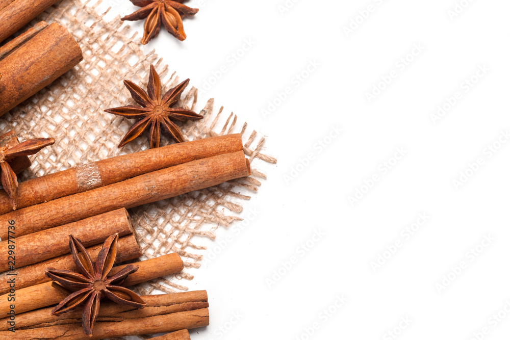 Cinnamon sticks and star anise isolated on white background Cinnamon sticks and star anise isolated on white background