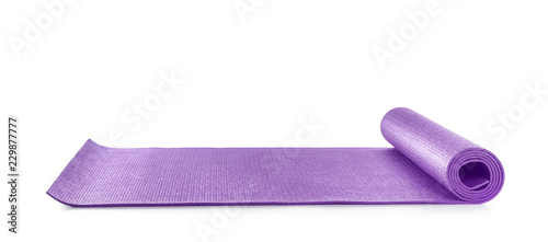 Color yoga mat on white background photo