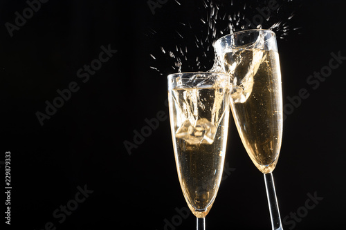 Glasses of champagne with splash