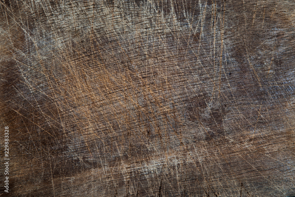 Fototapeta premium Old grunge wooden cutting kitchen desk board background texture.