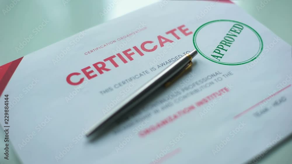 Certificate document approved, hand stamping seal on official paper, validation