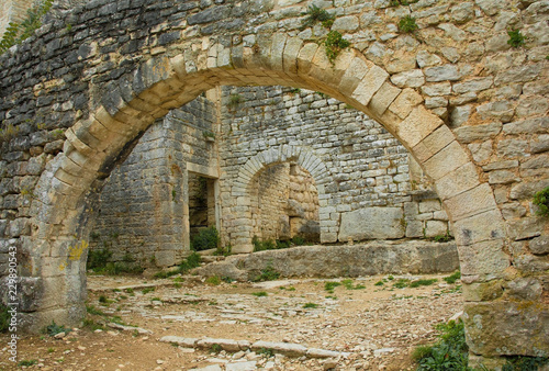Fototapeta Naklejka Na Ścianę i Meble -  An archway in Dvigrad, an abandoned medieval town in central Istria, Croatia, which was inhabited until the eighteenth century
