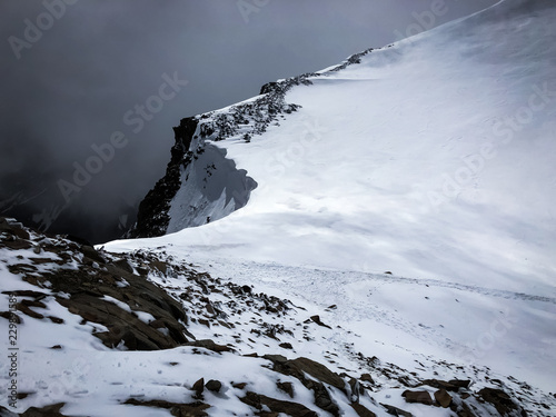 Glacier in summer and sharp cliff on the top of the Wildspitze (3770 m), the second highest mountain in Austria