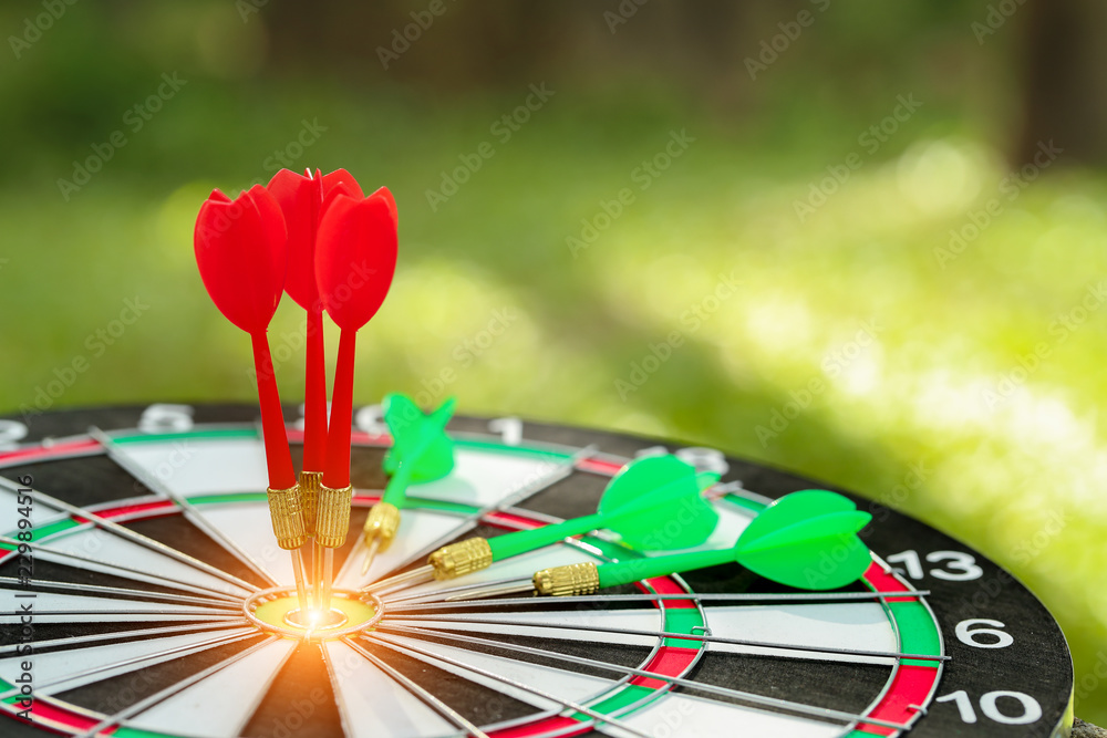 dartboard target center with arrows, idea of financial and business goal, using as background dartboard target center with arrows, idea of financial and business goal, using as background