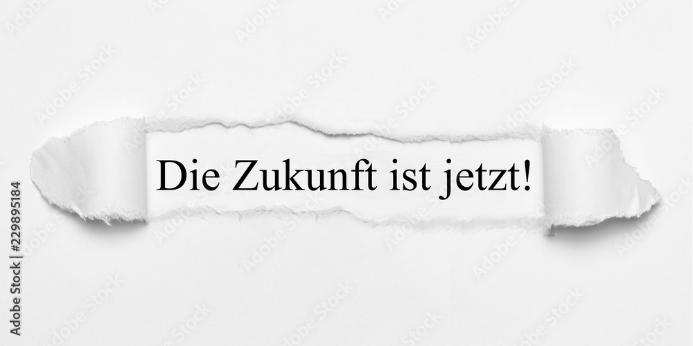 Obraz premium Die Zukunft ist jetzt! auf weißen gerissenen Papier