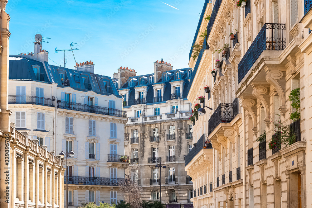 Paris, beautiful buildings boulevard des Batignolles, typical parisian facades 
