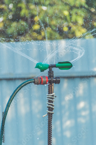 automatic watering system with water drops in the garden