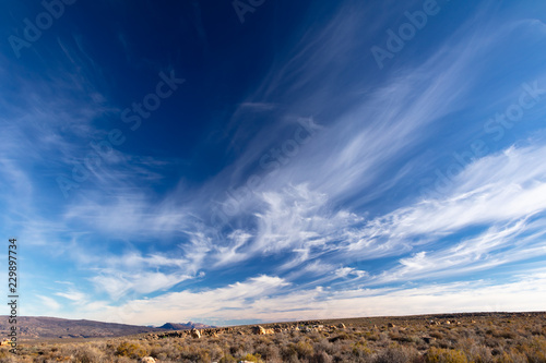 landscape with blue sky and white clouds In the Kagga Kamma Nature Reserve in South Africa photo
