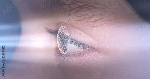 Young girl having a futuristic eye scan using facial recognition technology 