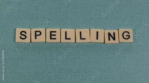 Animation with letters forming the word SPELLING.