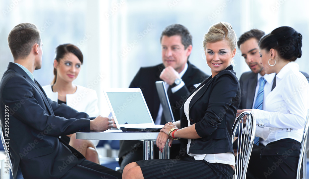 Business Team Discussing Ideas in Lounge Business Team Discussing Ideas in Lounge