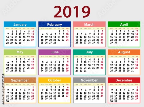 Multicolored calendar grid for 2019 in English. The week starts on Monday. The day off is Sunday.