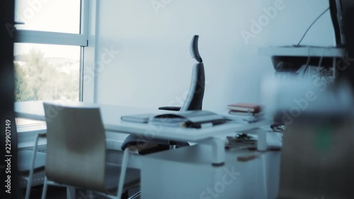 The interior view of a contemporary empty business office the chair returns inside papers comfortable empty design business nobody modern furniture work workplace paperwork architecture