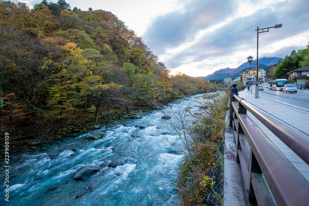 Kinugawa river in Nikko Prefecture, Japan dawn evening with mountain, river and cloud