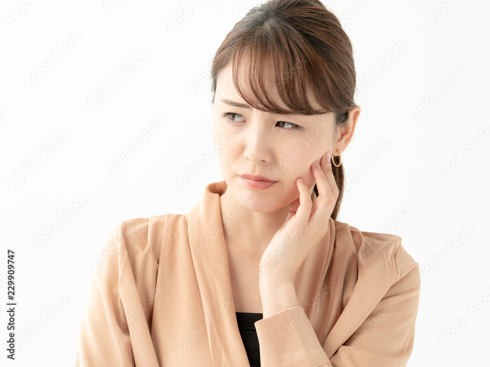 女性・歯・口腔・痛い