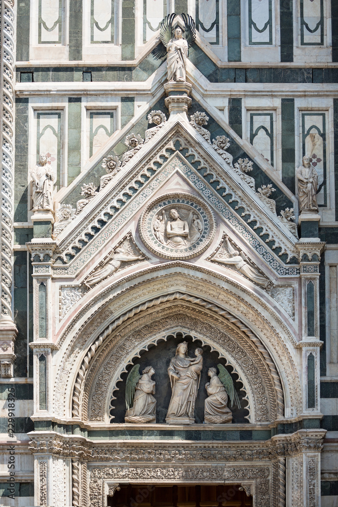 Door arch detail from Giotto's bell tower in Florence, Italy