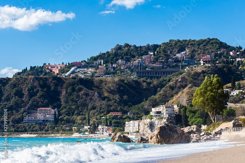 View from Letojanni to Taormina. Letojanni nestled to the north of Taormina, Letojanni is a popular coastal resort. Sicily, Italy.