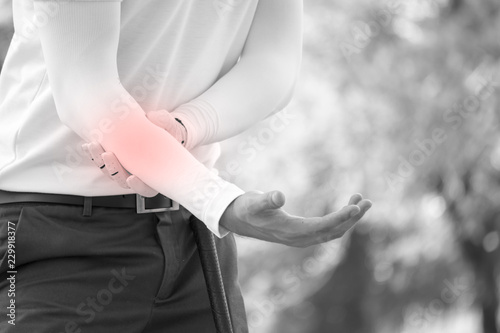 Golfer / player have arm muscle pain