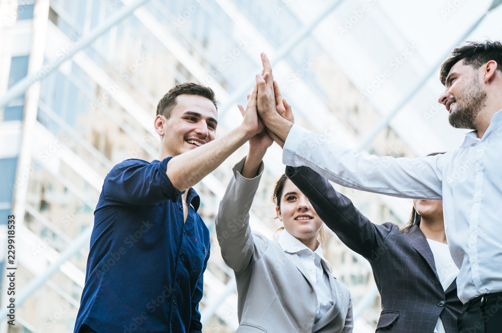 Businessman team cooperate to achieve target for successful on building in city background Businessman team cooperate to achieve target for successful on building in city background