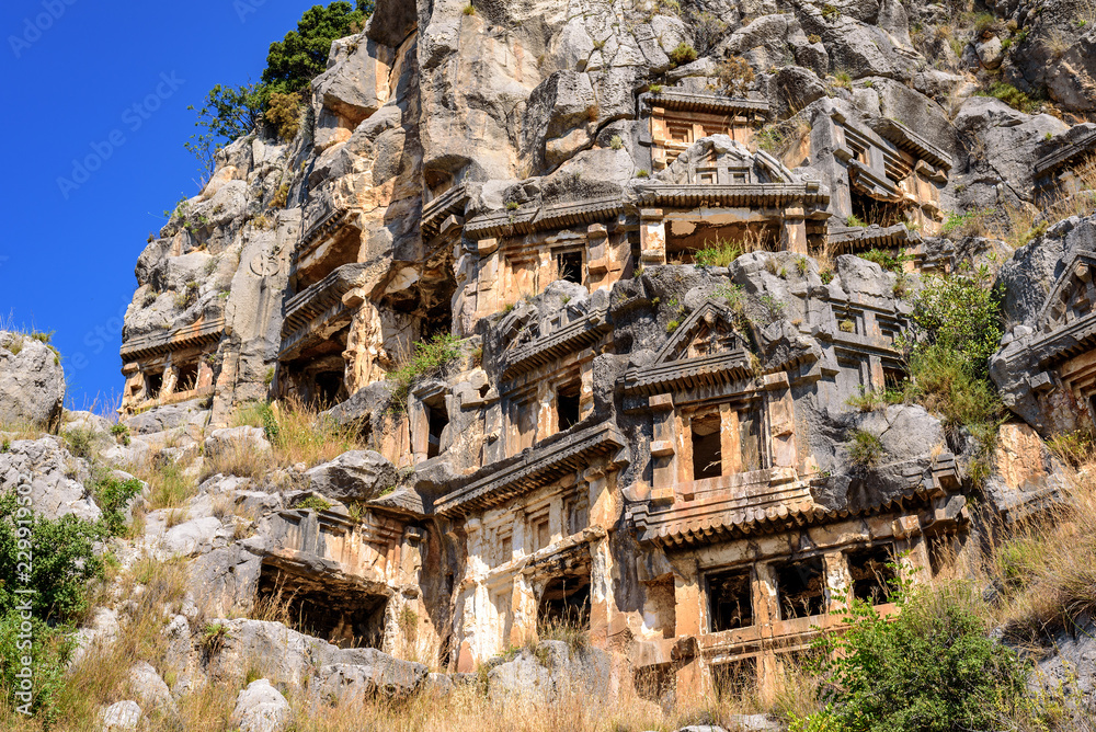 Old ruins of Roman, Lycian architecture, ancient crypt, caves in the mountains, Turkey, Demre.
