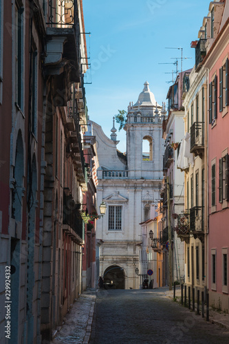 Narrow street and a church, Lisbon, Portugal