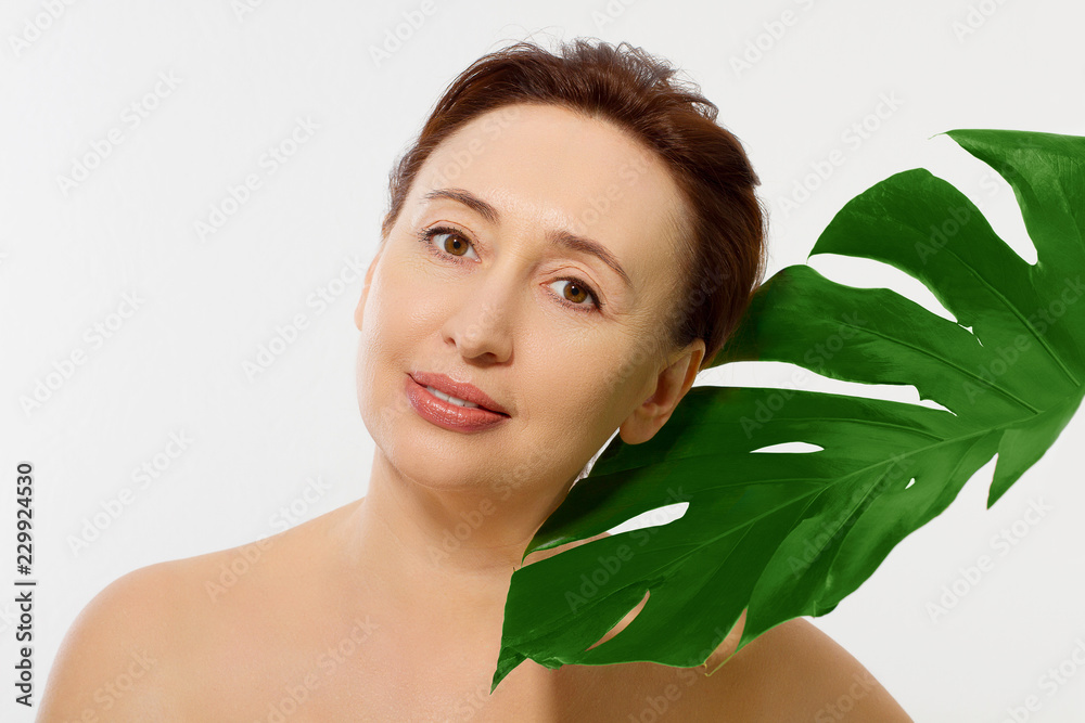 Beauty wrinkle middle age woman face portrait. Spa and anti aging concept Isolated on white background. Plastic surgery and collagen face injections. Wrinkles and menopause. Copy space Beauty wrinkle middle age woman face portrait. Spa and anti aging concept Isolated on white background. Plastic surgery and collagen face injections. Wrinkles and menopause. Copy space