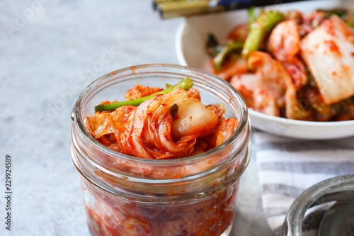 Homemade kimchi in a jar close up, selective focus photo