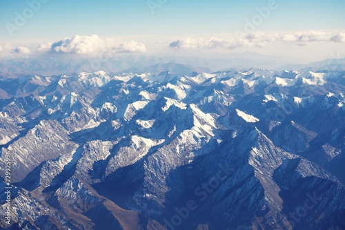 Top view of mountain range layers from airplane window  Tiansan  Xinjiang  China