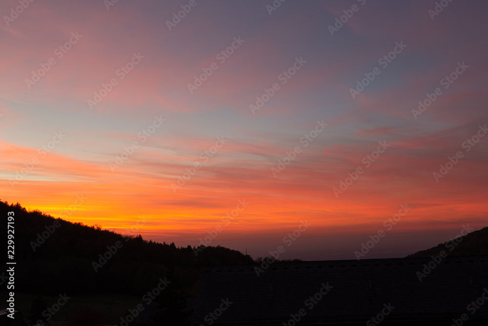 Beautiful dramatic sunset in german Black forest.