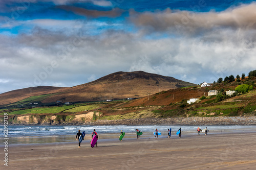 Photography Surfers in the Inch Strand in Ireland, Kerry County