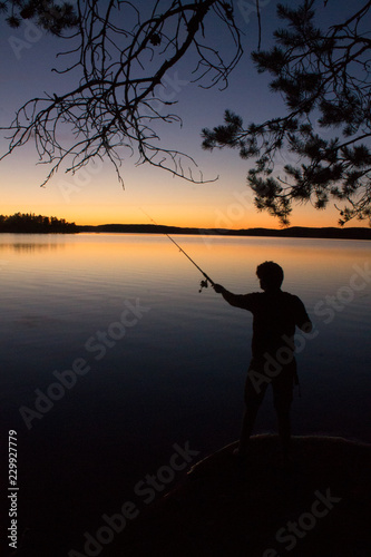 Fisherman at lake