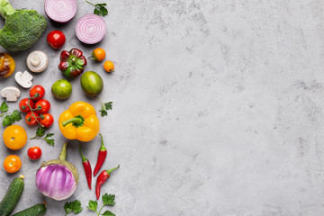 Fresh farm market vegetables on gray background