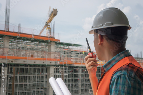 Φωτογραφία Engineer with a Walkie Talkie or Portable radio transceiver for communication