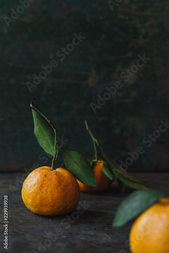 Mandarin orange on rustic background