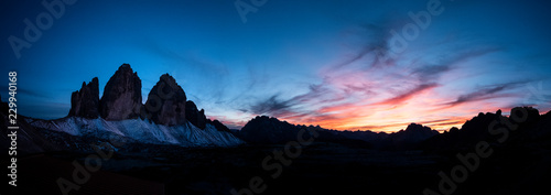 Mountains silhouettes on colorful sunrise